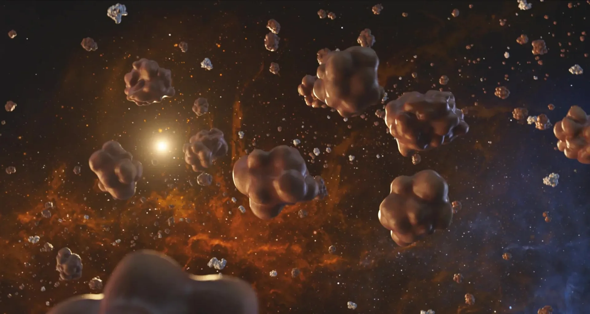 Chocolate-covered Crunchers drift like asteroids through a glowing orange galaxy.