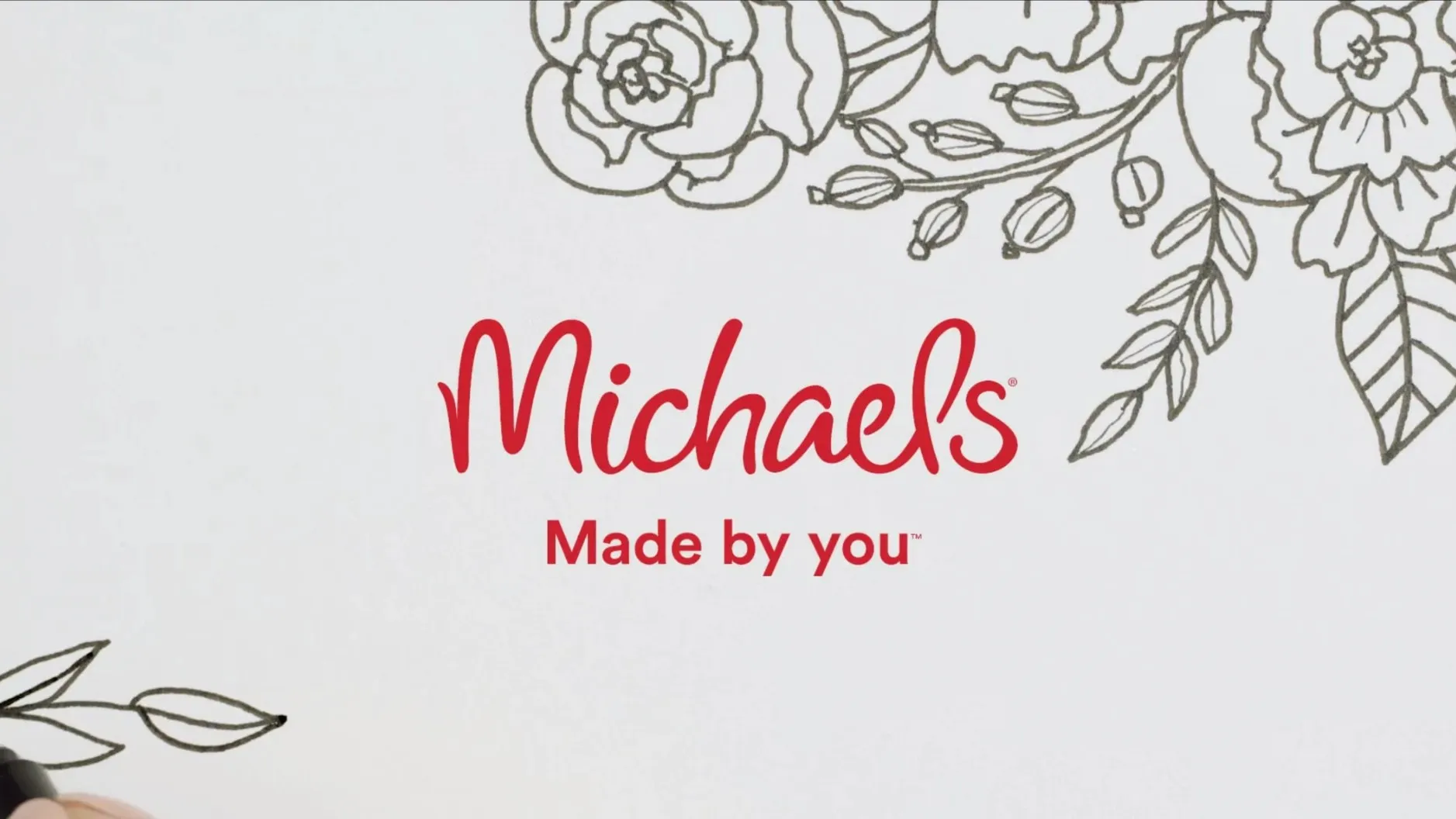 The red Michaels "Made by you" logo on white paper, framed by hand-inked flowers and leaves.