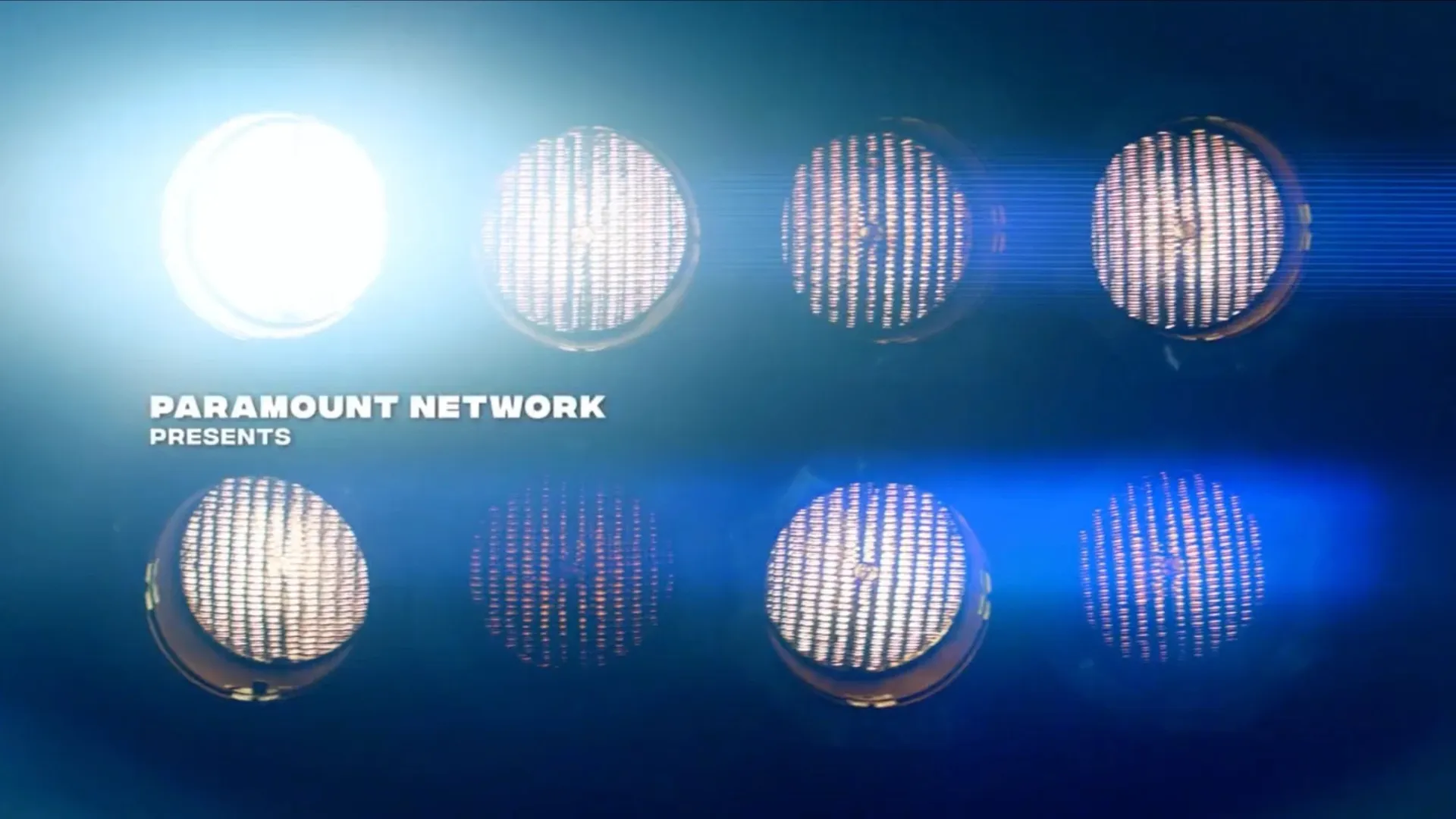 Two rows of glowing stadium lights in blue haze, with the words Paramount Network Presents.